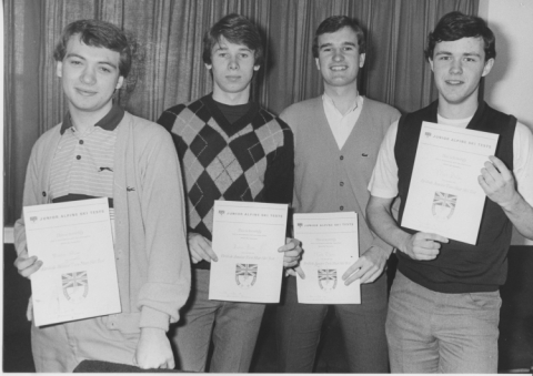 Presentation to four boys